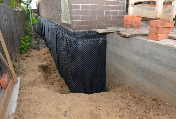 SJ Waterproofing Pros technician performing targeted Sump Pump Installation assessment in Midland, NC